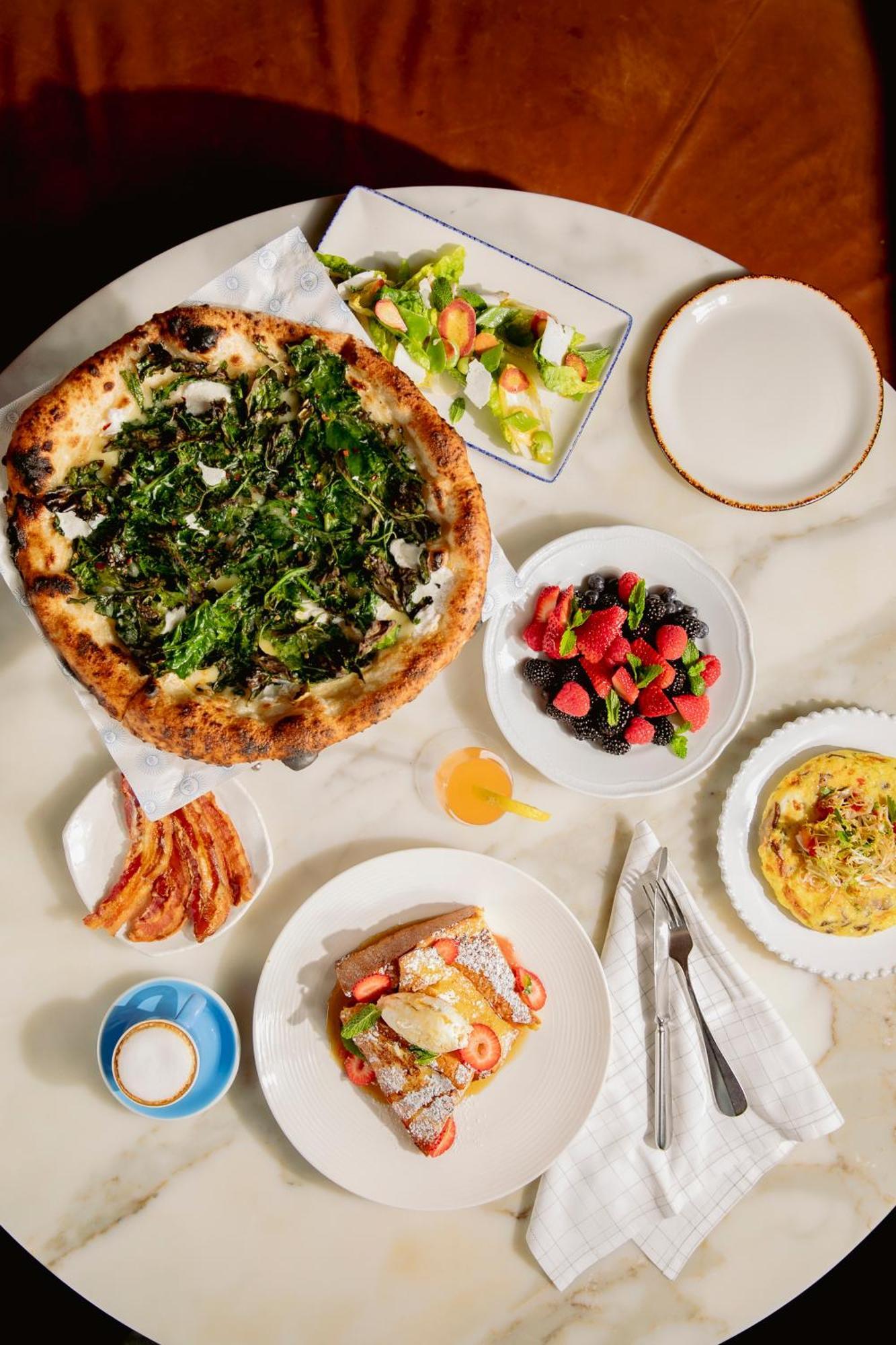 Hotel The William Vale New York Exteriér fotografie A selection of dishes at the restaurant